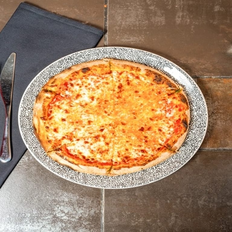 Savor our cheese pizza